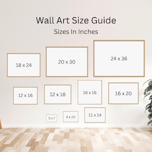 May include: Wall art size guide with sizes in inches. Displays various rectangular frames with dimensions such as 18 x 24 inches, 20 x 30 inches, and 24 x 36 inches. The guide is on a white wall with a wooden floor.