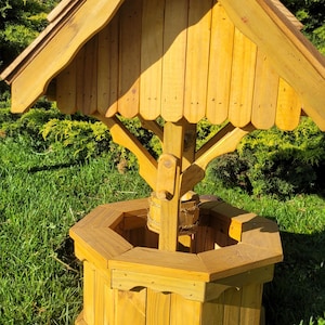 Rustic wooden wishing well for your garden