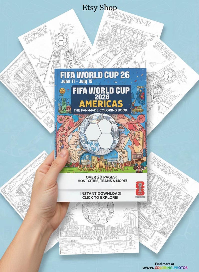 May include: A hand holds a coloring book titled "FIFA WORLD CUP 26 AMERICAS" with a soccer ball graphic. The book cover is blue and features the dates June 11 - July 19. Surrounding the book are several black and white coloring pages with soccer-related illustrations.