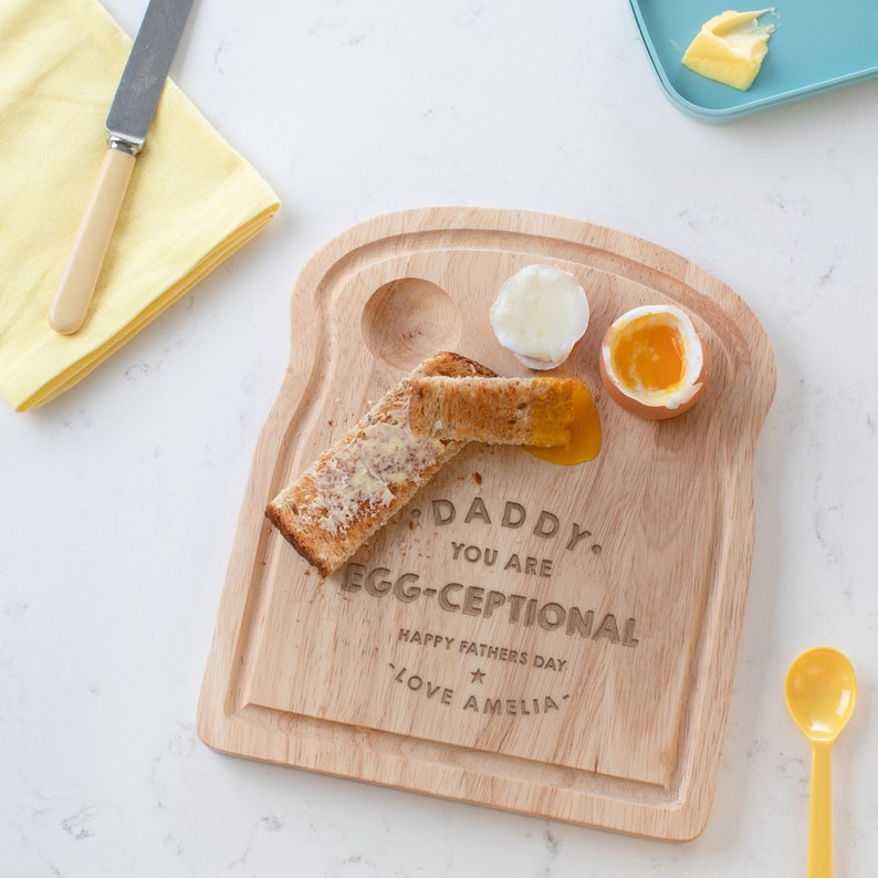 This custom egg and toast board offers you to add any text you want to make it more personal.