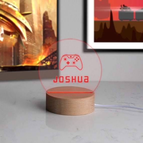 A personalized mini LED desk lamp with 96 favorites — actual physical craft with custom name etching and 7 colour modes, genuinely useful and giftable.