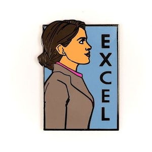 May include: A blue and white enamel pin featuring a woman with brown hair and a gray jacket. The text "EXCEL" is written vertically on the right side of the pin.