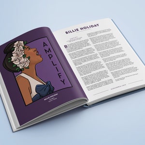 May include: An open book with a purple cover featuring a colorful illustration of Billie Holiday, a singer. The book title is "Amplify" and the text "Billie Holiday, Singer 1915-1959" is at the bottom of the page. The right page of the book is white with the text "Billie Holiday" in black at the top of the page.