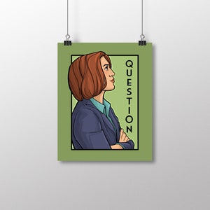 May include: A green poster with a cartoon illustration of a woman with brown hair and a blue suit. The text "QUESTION" is written vertically on the right side of the poster.