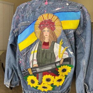 Hand-Painted Levi’s Denim Jacket – Ukrainian Flag, Sunflowers & Warrior Woman Art | Custom Oversized Tracker Jacket | Unique Wearable Art
