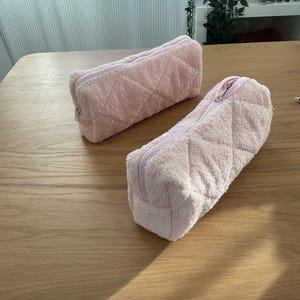 Trousse de toilette en éponge matelassée