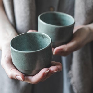 SET OF TWO handmade wheelthrown pottery cups for tea or coffee in minimal design, blue-green glaze with satin matte finish