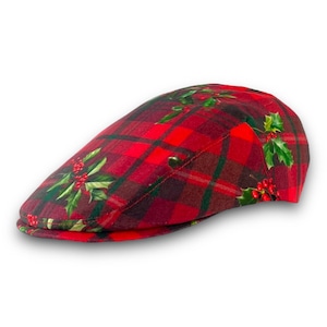 May include: A red and green tartan flat cap with a holly and berry design.