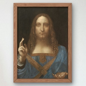 Peut inclure: Une peinture encadrée d'un homme aux cheveux longs et à la barbe, portant une robe bleue et tenant un orbe de cristal dans sa main droite. Sa main gauche est levée avec deux doigts tendus. L'arrière-plan est sombre.