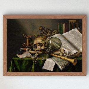 May include: A framed vanitas still life painting featuring a human skull, an open book with visible text, a green glass vessel, a wooden flute, a pocket watch, and various papers arranged on a dark green cloth surface in a wooden frame.