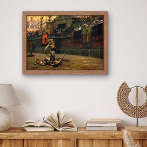 May include: A painting depicting a scene from a Roman gladiatorial contest. A victorious gladiator stands over a fallen opponent in a bloody arena. The painting is framed in a wooden frame.