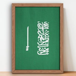May include: A framed green canvas featuring the flag of Saudi Arabia. The flag depicts a white sword and Arabic script in white.