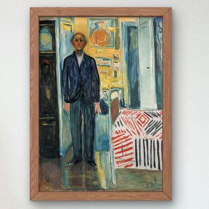 May include: A framed print of a painting depicting a man in a dark suit standing in a doorway. The interior scene features a table with a red and white patterned tablecloth and a yellow wall.