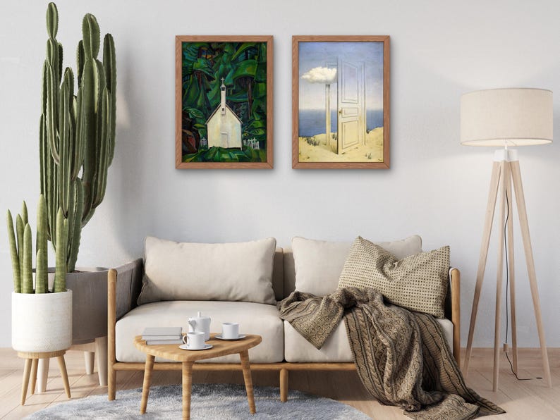 May include: Two framed paintings on a white wall. The painting on the left shows a white building with a green roof surrounded by trees. The painting on the right shows a white door opening into a blue sky with a white cloud.