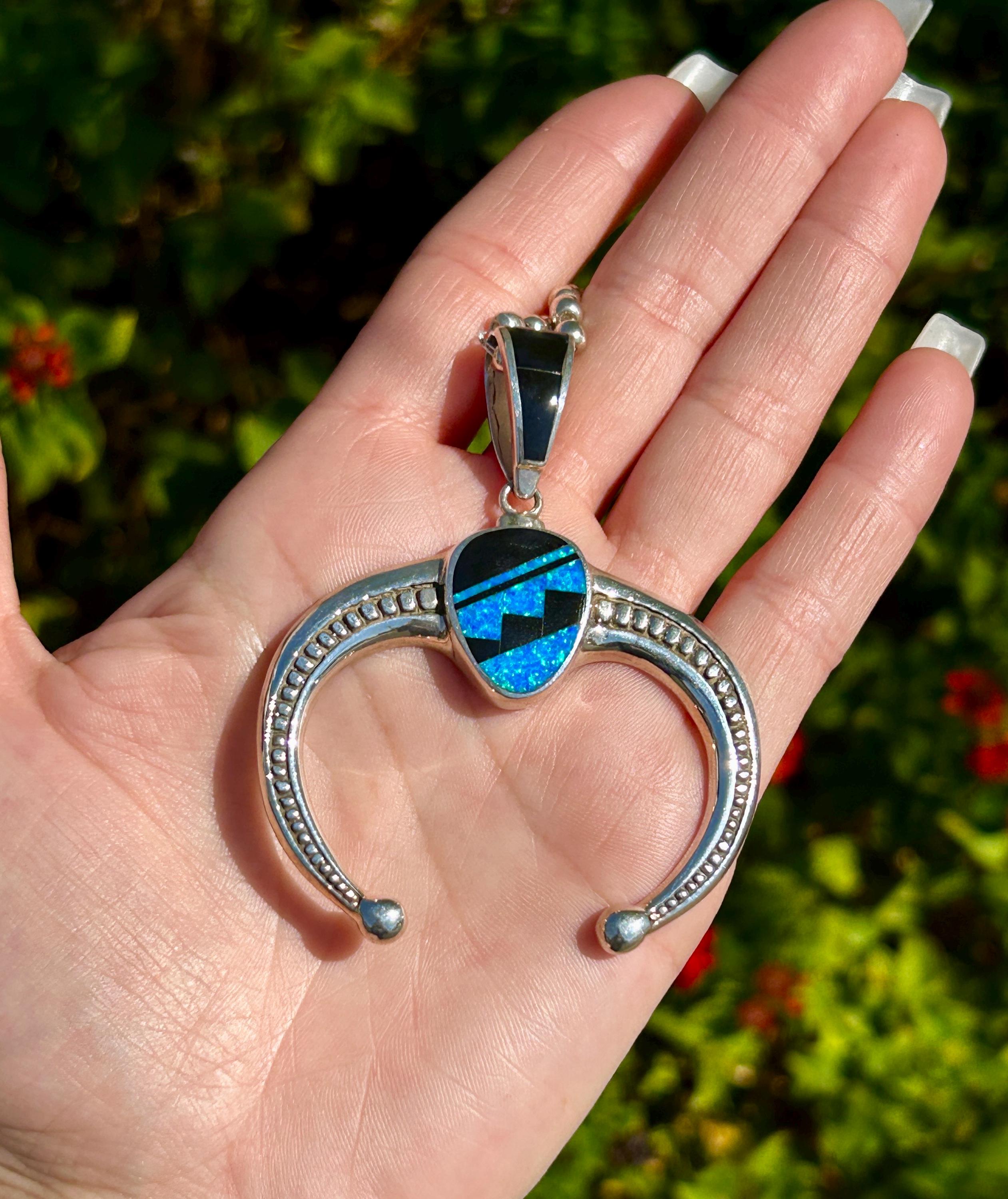 Naja pendant symbol discount