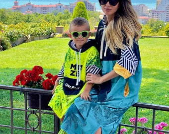 Poncho da spiaggia da donna con cappuccio e tasca/asciugamano fasciatoio per costume da bagno per il surf o il tempo libero