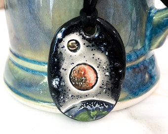 Planets in Space Ceramic Necklace in Black and Gray