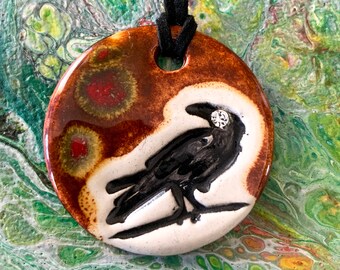 Raven with Rhinestone Eye Ceramic Necklace in Red and Brown and Black