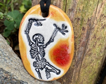 Dancing Skeleton Ceramic Necklace in Orange and Red