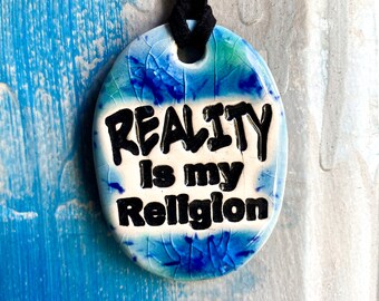 Reality is my Religion Ceramic Necklace in Blue
