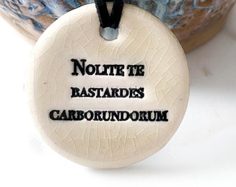 Nolite te Bastardes Carborundorum Ceramic Necklace in Parchment Crackle