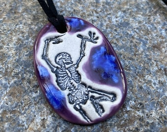 Dancing Skeleton Ceramic Necklace in Purple