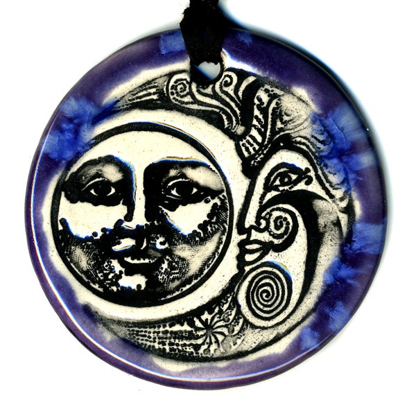 Phases of the Moon or Pareidolia in Purple and Blue