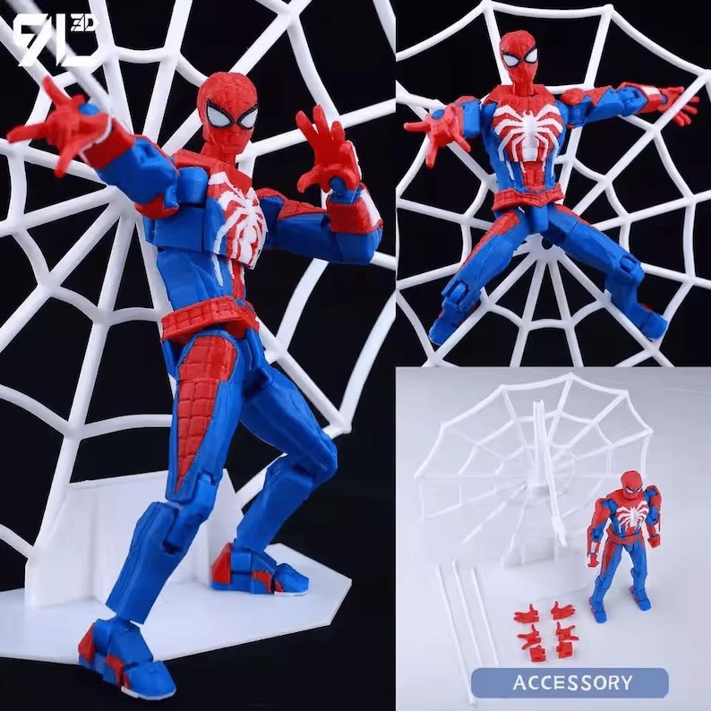May include: A posable action figure featuring a red and blue suit with a white spider emblem on the chest. The figure includes a white plastic web backdrop, interchangeable hands, and two thin white rods. The logo 3D is visible in the corner.