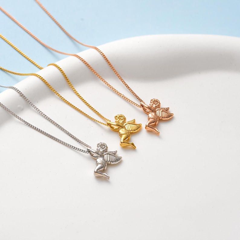 ✨ Guardian Angel Pendant Necklace – Cherub Charm Jewelry ✨  

A beautifully detailed angel pendant symbolizing protection, love, and guidance. This timeless piece makes a meaningful gift for loved ones or a treasured keepsake for yourself.  

💛 Product Details  
• Material: 925K Sterling Silver / 14K Solid Gold  
• Closure: Spring Ring  
• Pendant Size: Approx. 20mm height  
• Sold as: Pendant with chain included  
• Hypoallergenic & safe for sensitive skin