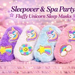 May include: Four fluffy unicorn sleep masks in purple, white, blue, and pink. Each mask features a unicorn design and a colorful accent like a rainbow or a smiling flower. The image has text that says "Sleepover & Spa Party! Fluffy Unicorn Sleep Masks."