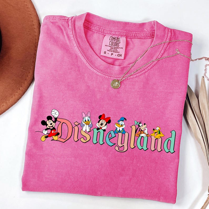 May include: A rustic wooden sign with the text "Welcome to our home" in white lettering. The sign features a distressed finish and a simple, inviting design, perfect for entryway decor.