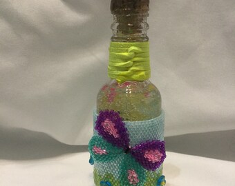 Happy "potion" bottle with butterflies
