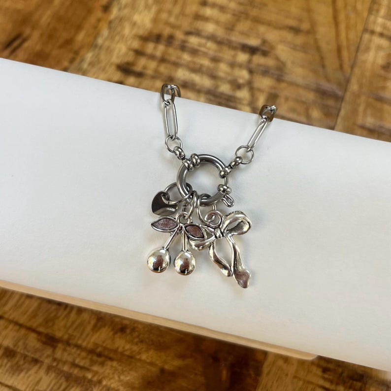 The Bow and Cherry Silver Pendent Charm Bracelet Cherries Disco Ball