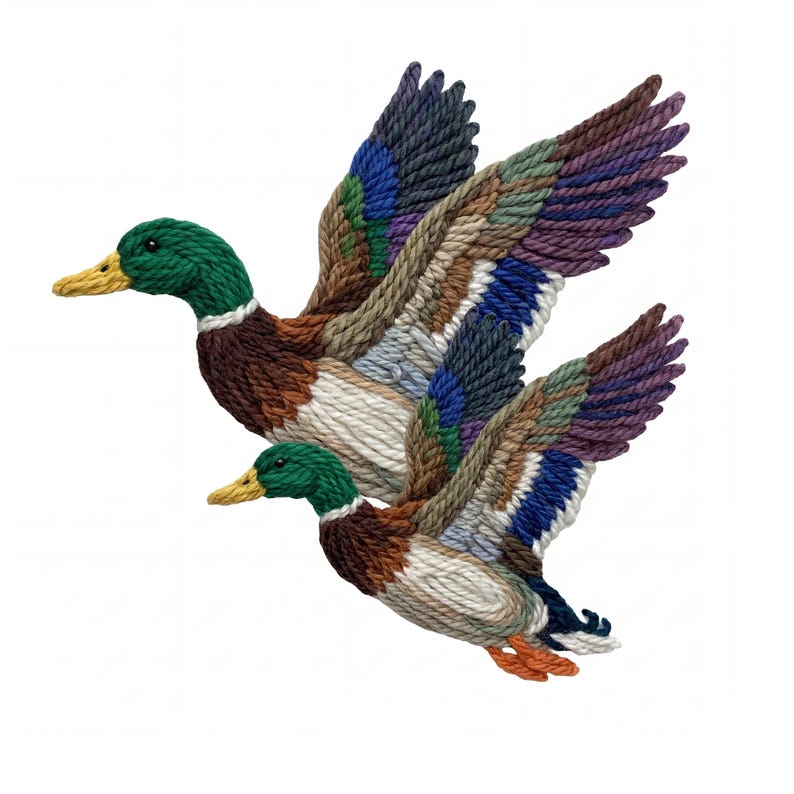 A colorful embroidered image of two ducks in flight, with intricate details and vibrant colors.