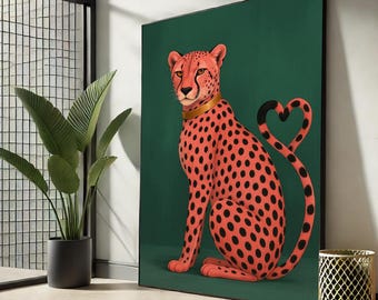 May include: A large, framed art print featuring a stylized cheetah with a heart-shaped tail. The cheetah is coral with black spots and a gold collar, set against a deep green background. The artwork is displayed in a modern interior setting.