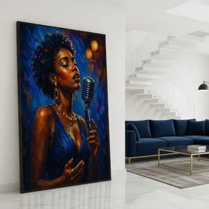 May include: A framed painting depicting a Black woman singing into a vintage microphone. She is dressed in a blue gown and gold jewellery. The background features a mix of blue and orange tones, creating a dramatic effect. The artwork is displayed in a modern living room.