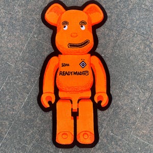 Handmade Bearbrick Rug: Detailed Designer Decor