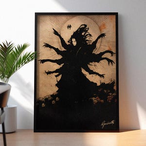 May include: Black framed art print featuring a dark silhouette of a figure with multiple arms, set against a beige background with a circular design. The Japanese character for "God" is at the top. The artist's signature is at the bottom.
