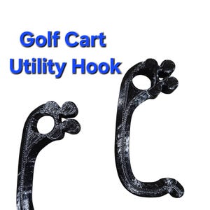 May include: Two black plastic golf cart utility hooks. The hooks are designed to hang items from the side of a golf cart.
