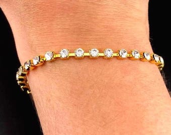 Vintage goudkleurige strass tennisarmband