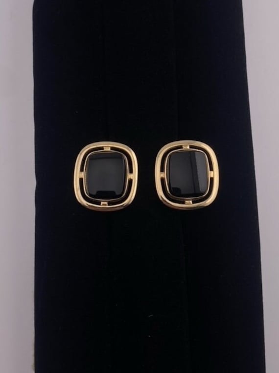 Black and gold tone cufflinks