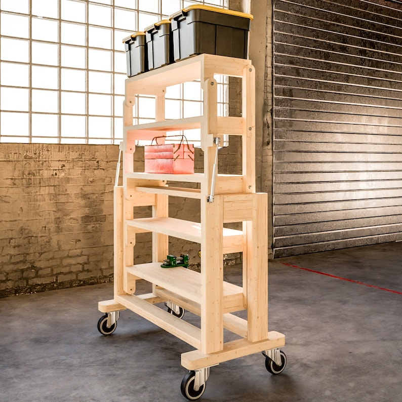 May include: A wooden rolling shelf unit with four shelves and four wheels. The top shelf has four plastic storage bins in black and yellow. The shelf is made of natural wood.