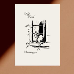 May include: A black and white illustration on a cream-colored card. The image depicts a cat sitting on a windowsill, with a window and foliage in the background. The text "Hey Friend" and "I'm missing you" are written in cursive.