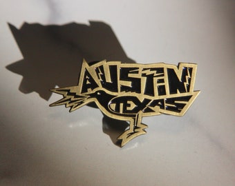 Austin Grackle Enamel Pin