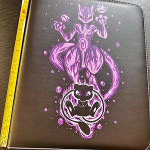 Card binder with 50 sleeves new (holds up to 900 cards). Blue & purple cover. Fast shipping!