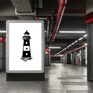 May include: A black and white graphic of a lighthouse on a white rectangular sign. The lighthouse has a detailed design with a light at the top and is set against a background of water. The sign is in a public space.