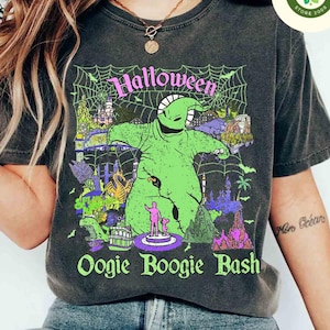 May include: Dark grey t-shirt with a green Oogie Boogie design, the words "Halloween" and "Oogie Boogie Bash". The design includes a spiderweb, castle, and other Halloween-themed elements.