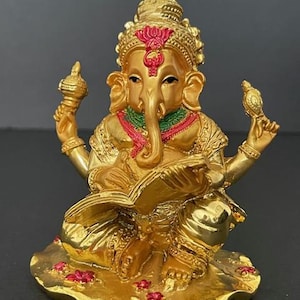 Lord Ganesh Reading Statue-Golden Home, Office , Car Dashboard Decor/ Ganesha statue