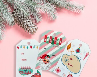 May include: Three Christmas gift tags with different designs. One tag has a Santa Claus illustration and says "Holiday Greetings". Another tag has a red truck and says "Merry and Bright". The third tag has a retro design with ornaments and says "To: From:".