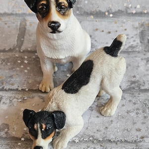 Realistic two figurine tri colored Jack Russell Terrier, made in Italy 1988.